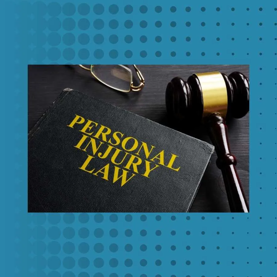 Personal Injury Law Book with Gavel and Glasses
