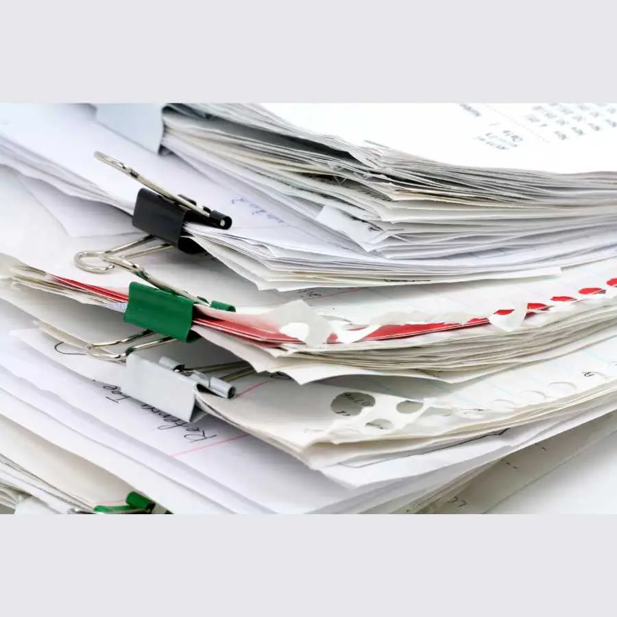 Stack of documents with paper clips