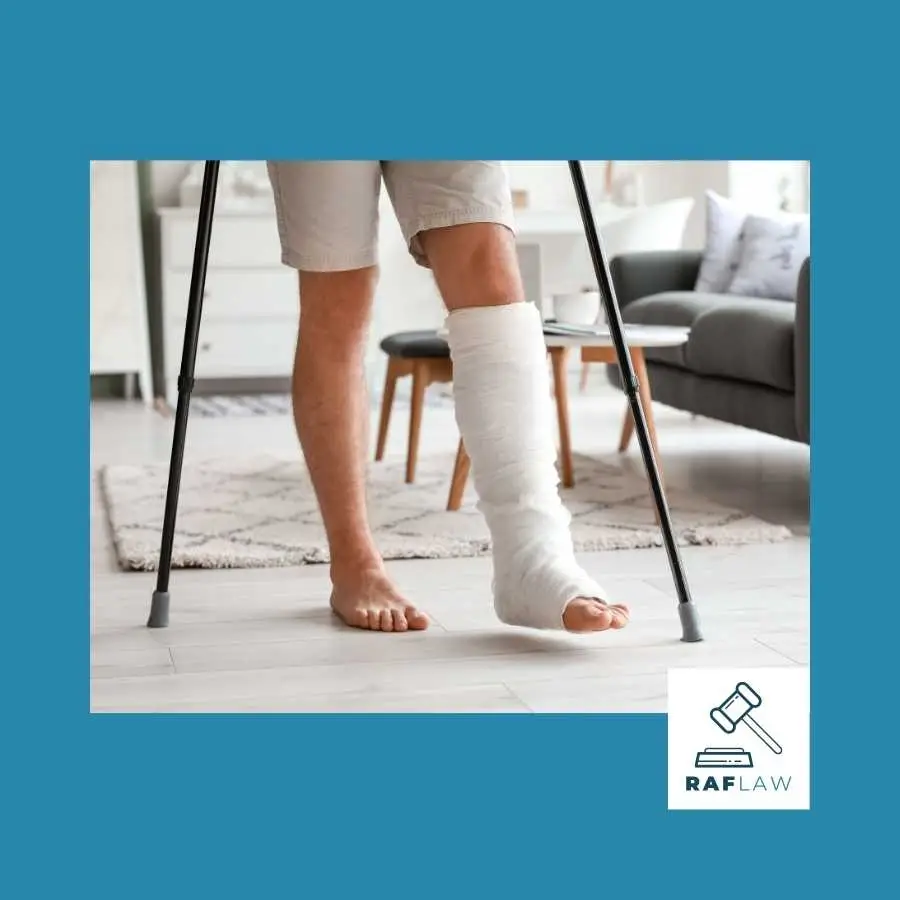 Man with a bandaged leg using crutches to walk in a modern living room, representing recovery and support from RAF Law after a leg injury.