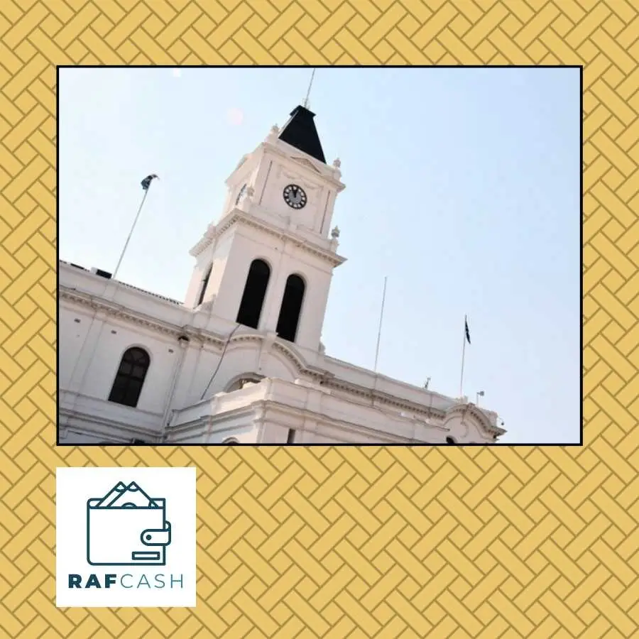 Krugersdorp Town Hall Clock Tower Standing Proud Against a Clear Blue Sky, Reflecting South Africa's Rich Heritage