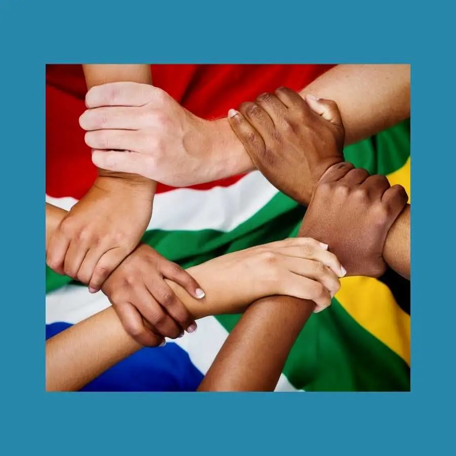 Diverse Hands Grasping Each Other Over South African Flag