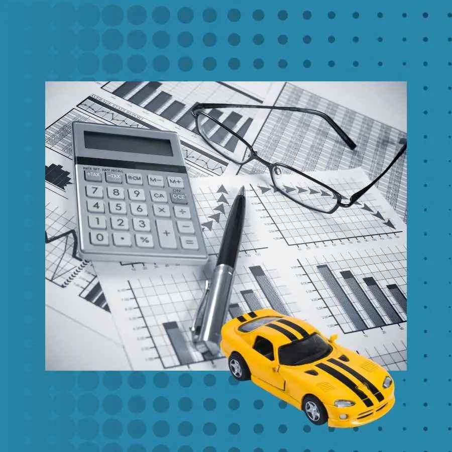 Financial analysis of the automotive industry with a toy car, calculator, and graphs