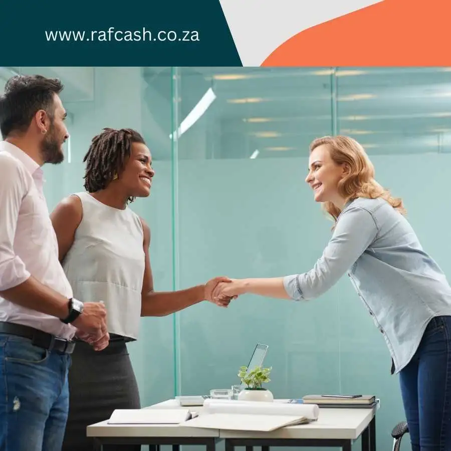 Business colleagues greeting each other in a modern office setting