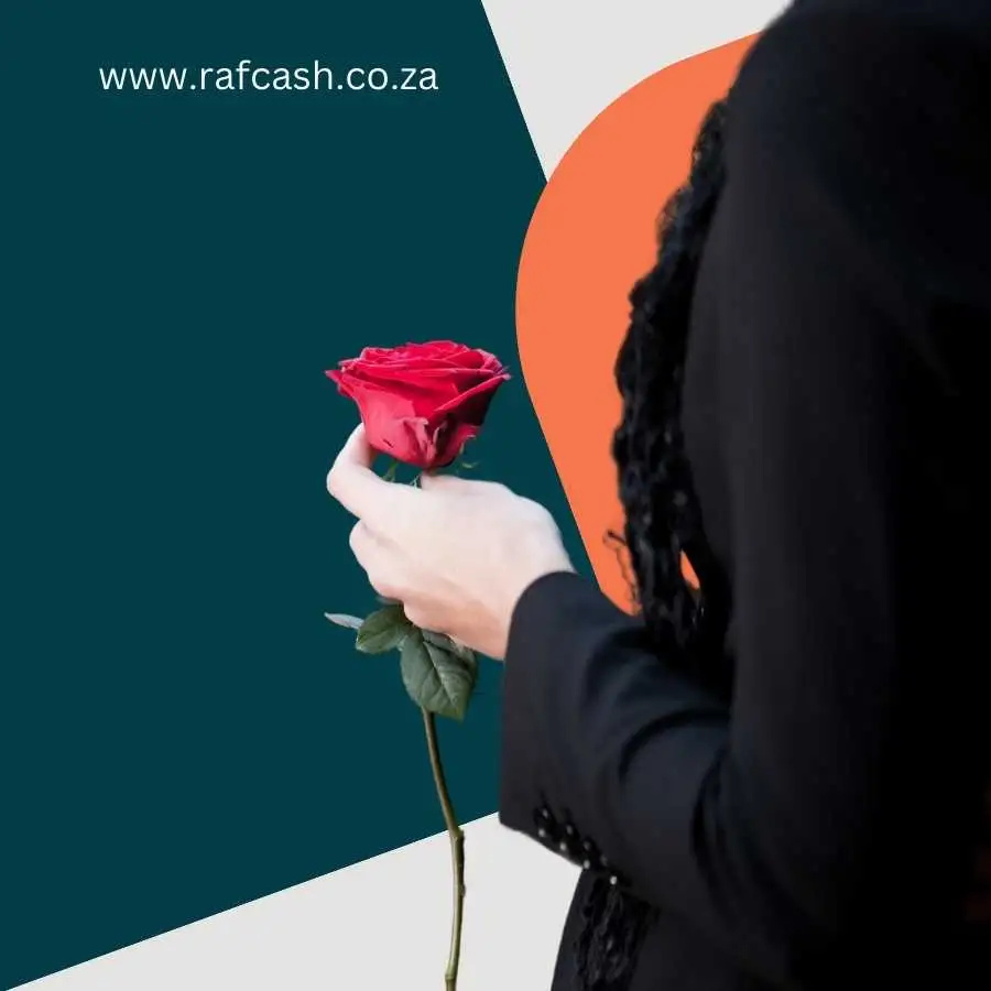 Woman in mourning attire holding a red rose symbolizing remembrance and support for road accident victims