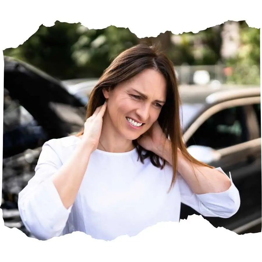 Woman experiencing neck pain after a car accident