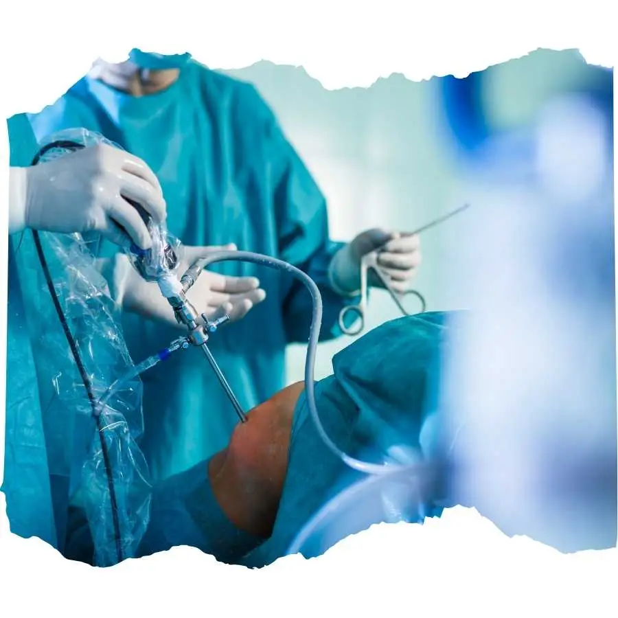 Surgeon performing orthopedic surgery with advanced equipment