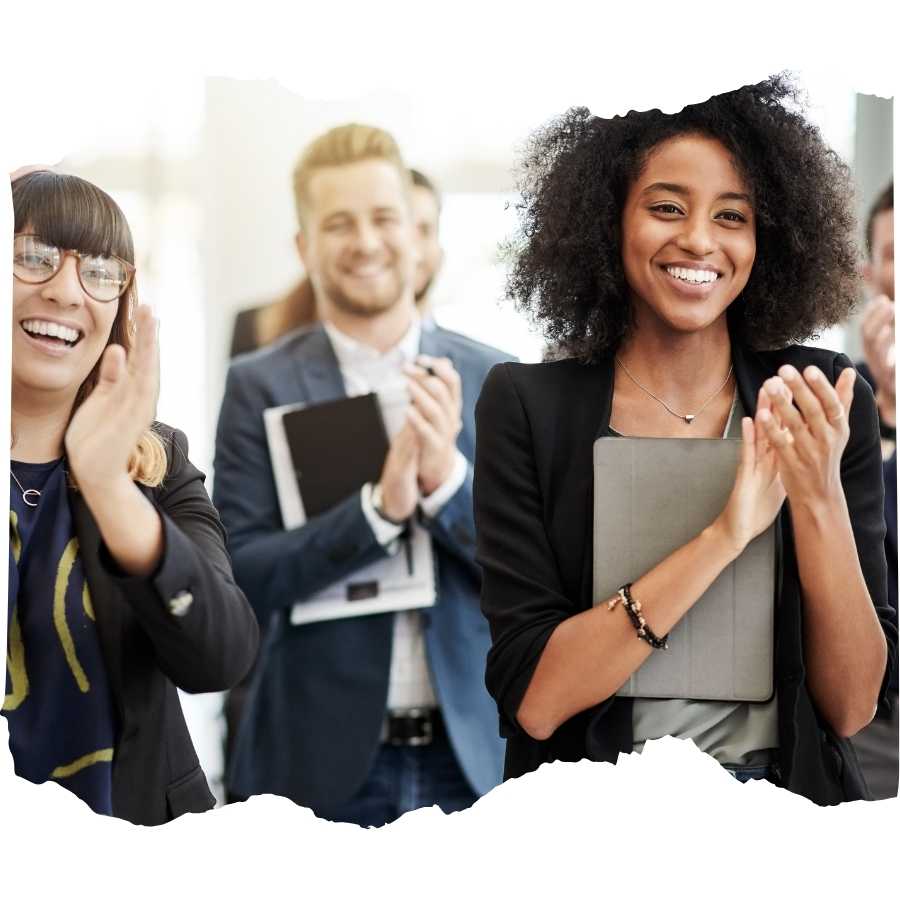 Enthusiastic employees clapping in a corporate setting