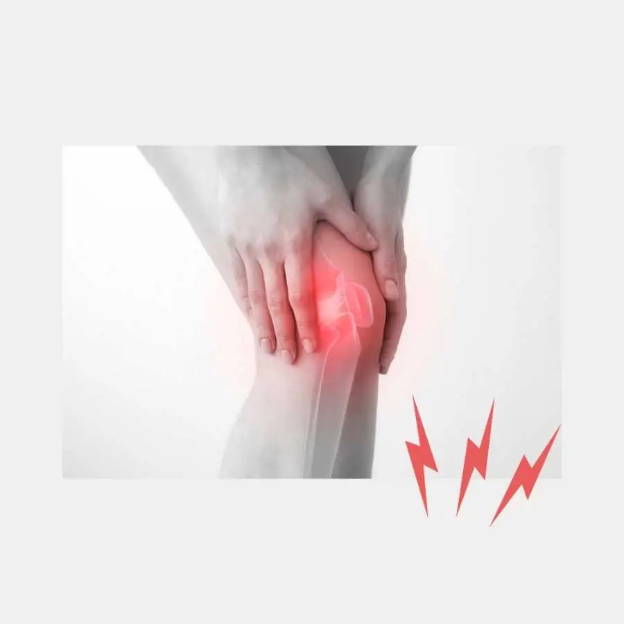 Person holding knee in pain with highlighted area showing inflammation