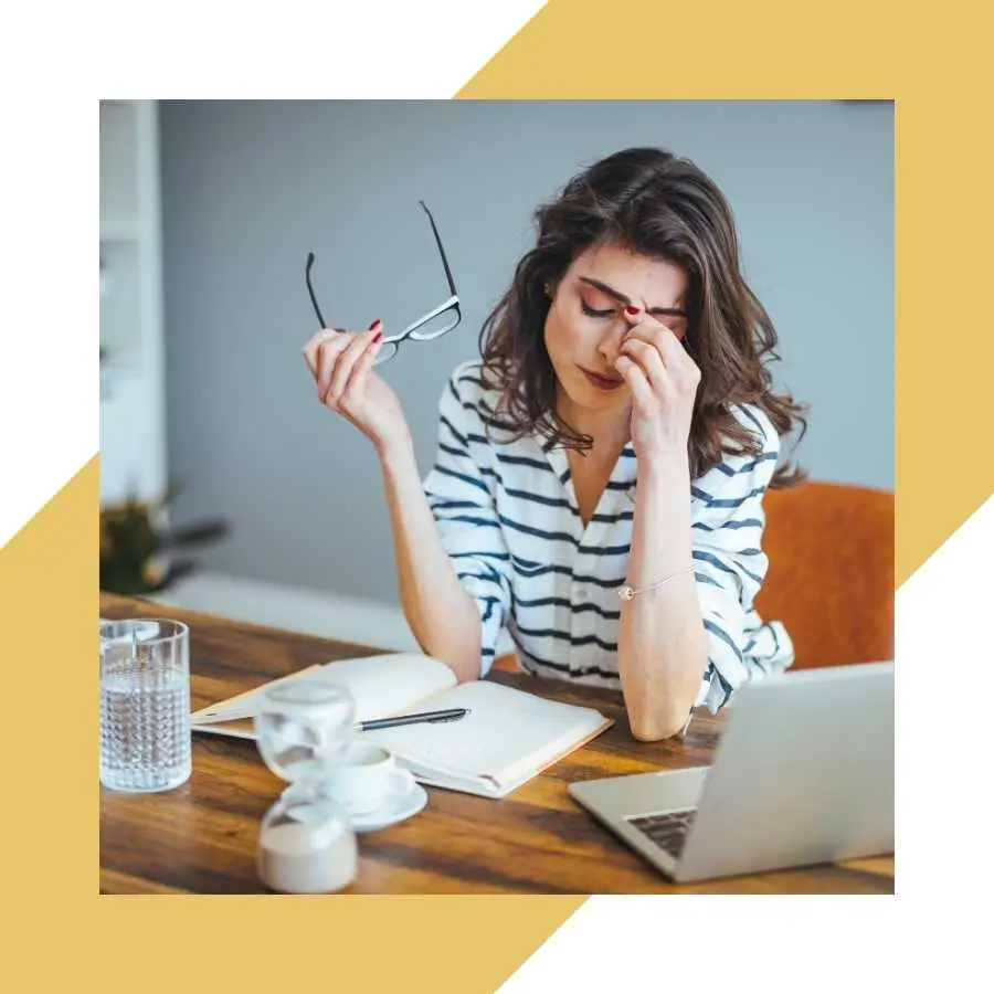 Woman stressed while reviewing documents, emphasizing the complexity of RAF claims