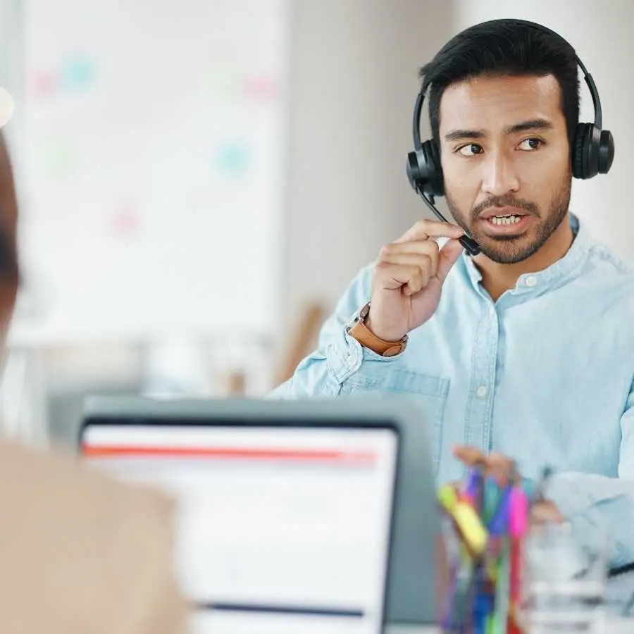 Customer service representative assisting a client with bridging finance queries