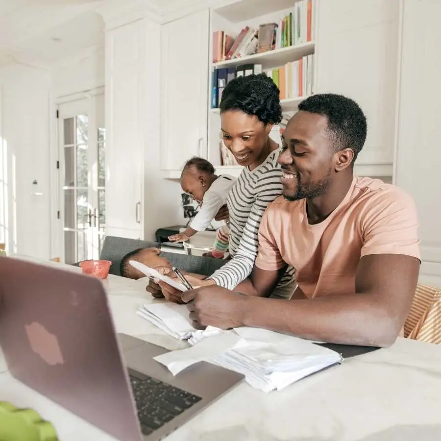 Family reviewing financial documents together at home