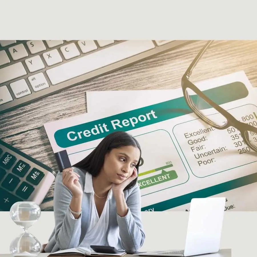 Woman reviewing her credit report at a desk